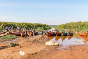 Boats & People At Mabamba Swamp
